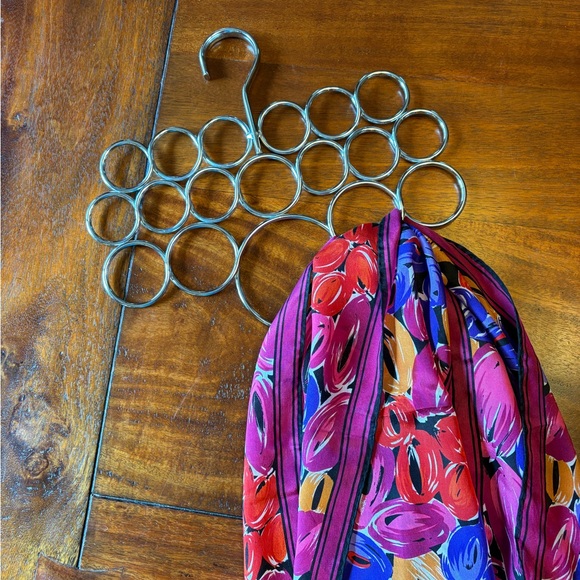 How To Tie A Scarf book with a beautiful scarf and a scarf hanger. - Picture 6 of 11